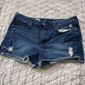Dark denim distressed cut off shorts